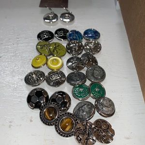 One pair silver tone snap leverback earrings with 13 pair snaps. NWT